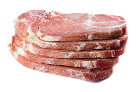 Five slice uncooked pork chopsの写真素材