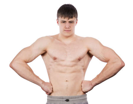 Man shows biceps on a white backgroundの写真素材