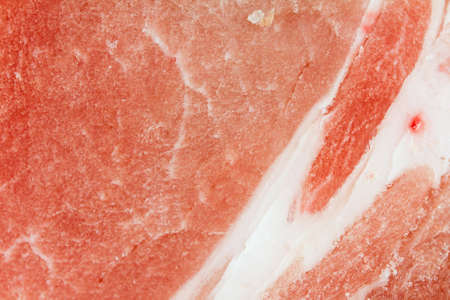 uncooked pork chops close upの写真素材