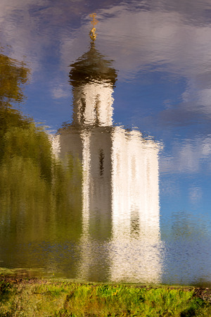 Reflection in water Church of the Intercession on the Nerl. Built in 12th century. Bogolyubovo, Vladimir region, Golden Ring of Russiaの写真素材