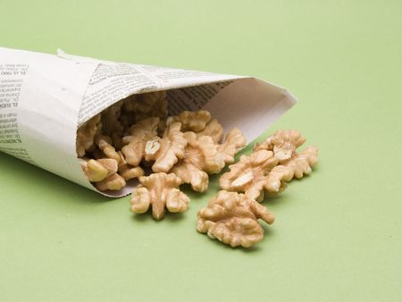 newspaper cone with nutsの写真素材