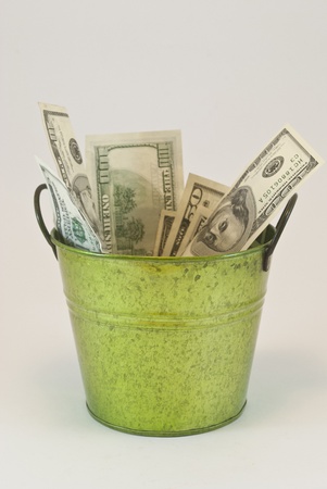 bucket with dollarsの写真素材