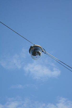 street lamp with blue sky in the background. public road lighting
