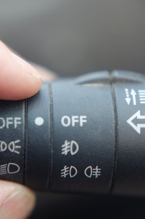 control or knob for turning on low, high and position lights of the car