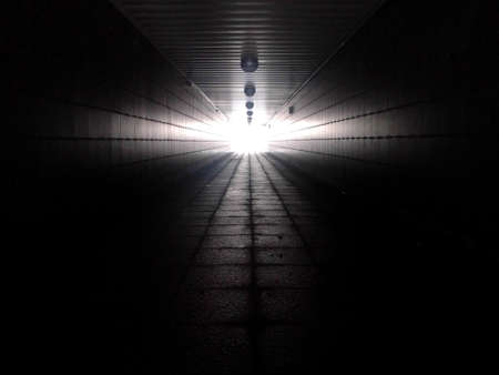 light at the end of an underpass tunnelの写真素材