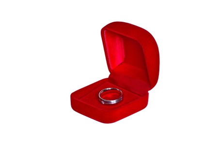 Ring in open red velvet box  isolated on white backgroundの写真素材