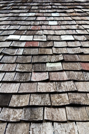 old worn shingle roof pattern in thailandの写真素材