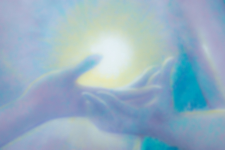 Painting the light in the middle hand, blurred for backgrounds.の写真素材