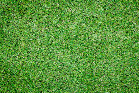 Background texture with fake grass top view.の写真素材