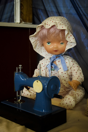 doll and sewing machine, retro toys, toys in the ussrの写真素材