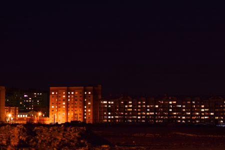 Night cute city. Night city. Light in the windows of the house.の写真素材