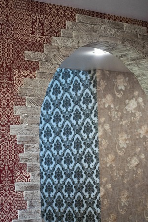 Wall design. Decorative stone on the wall. Decorating the arch with decorative stone.