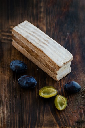 Fruit leather of plums and pears. Russian pastila. Fruit plum strudel cake.の写真素材