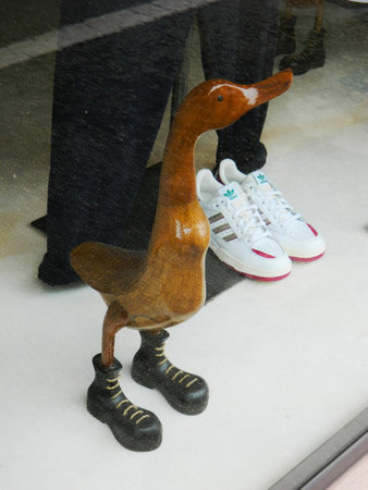 Rimini, Italy - December 26, 2014: modern white sneaker in shoe store. Sportive footwear by adidas.のeditorial素材