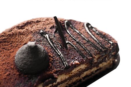 Chocolate truffle biscuit cake decorated with chocolate glaze. Yummy cake.