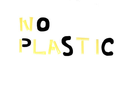 Yellow plastic straws on white background. Concept - no plastic, plastic free lifestyle and environment protection.の写真素材