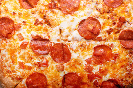 Delicious italian pizza. Tasty traditional italian pepperoni pizza.の写真素材