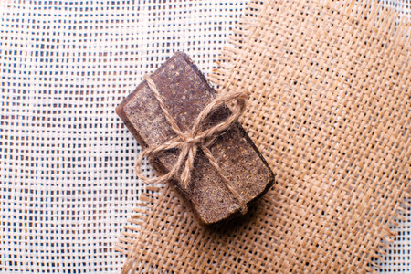 Piece of handmade soap with coffee beans. Spa concept for massage and relax.の写真素材