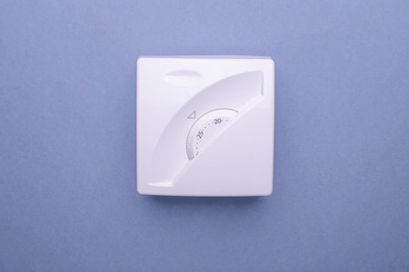 showing the temperature in celsius in the house. The concept of saving gas and electricity. Save...