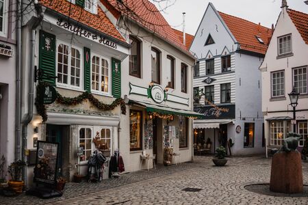 ingBremen, Germany, January, 2019 - Evening on the street with xolorful houses in historic Schnoorviertelのeditorial素材