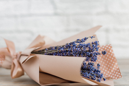 Dried lavander bouquet on white background, copy space, toned, banner, selected focusの写真素材