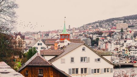 Zurich, Switzerland - March 2017: View of historic Zurich city center on a spring cloudy dayのeditorial素材