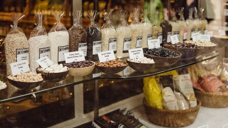 Zurich, Switzerland - March, 2017: Glass shop window with organic groats in Zurich, Switzerlandのeditorial素材