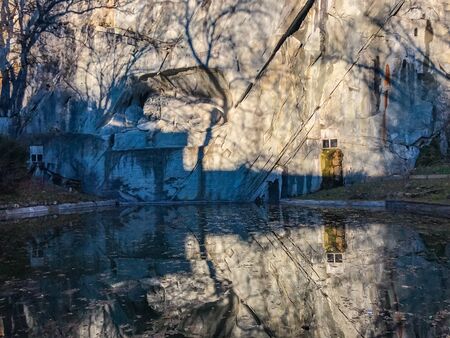 LUCERNE, SWITZERLAND - March, 2017: cityscape view of Chapel bridge and historic city center of Lucerne with famous lake Lucerne (Vierwaldstattersee) with beautiful reflections of houses in the waterのeditorial素材