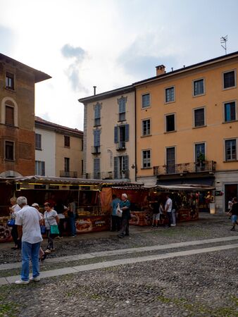 Como, ITALY - MAY, 2018: People on a cozy streets of Como cityのeditorial素材