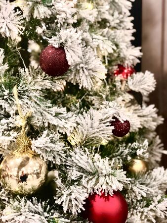 Closeup of Christmas tree with light, snow flake and decorations. Christmas and New Year holiday...
