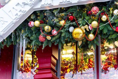 Closeup of Christmas tree with light, snow flake and decorations. Christmas and New Year holiday backgroundの写真素材