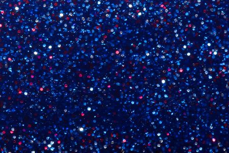 Abstract background with highlights and colored garlands on dark blue backgroundの写真素材