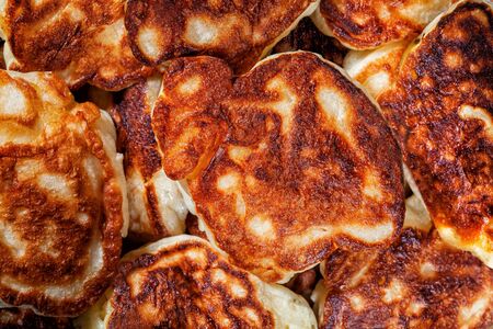 fried fritters close-up top view food backgroundの写真素材