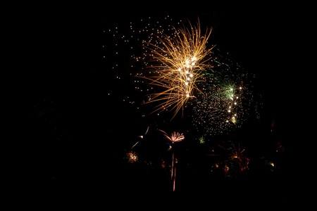 New Years Eve fireworks against black skyの写真素材