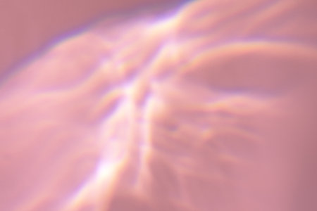 Beautiful lights and shadows of glass on pink or purple background. Overlay mode. Caustic effect of...