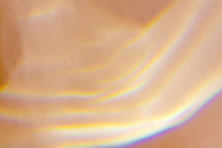 Beautiful lights and shadows on beige background. Overlay mode. Caustic effect of light. Shadows...
