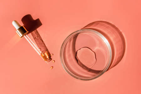 Laboratory glass petri with pipette and drop of water, serum, oil, beauty product. Natural medicine,...