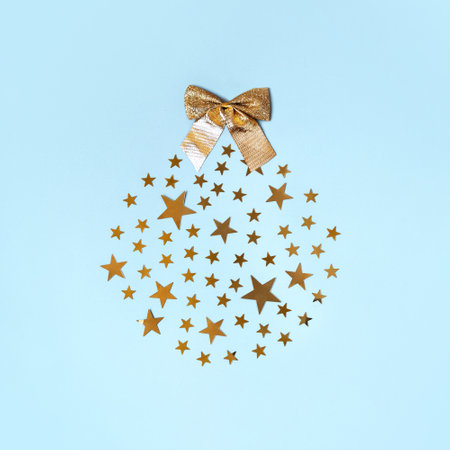Xmas ball made of different small stars and a bow. Minimalistic Christmas concept. Postcard design....