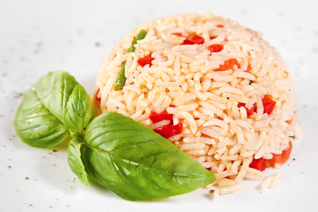 Risotto of spring vegetables with basil twigの写真素材