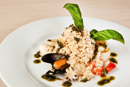 Risotto with prawns, mussels, octopus, squids and deep-sea scallopの写真素材