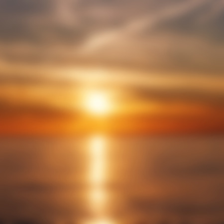 Abstract blurred image of sunrise as a background for your design