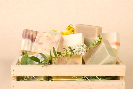 group of handmade soap in wooden box, nature material.の写真素材