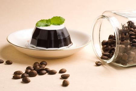 Coffee, coffee pudding and coffee beans in glass jarの写真素材