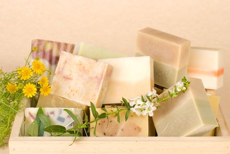 group of handmade soap in wooden box, nature material.の写真素材