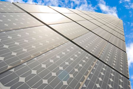 series of solar energy panels under blue skyの写真素材