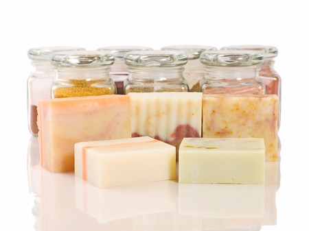 handmade soap and its raw materials in glass (Lavender, Calendula, and Chamomile)の写真素材
