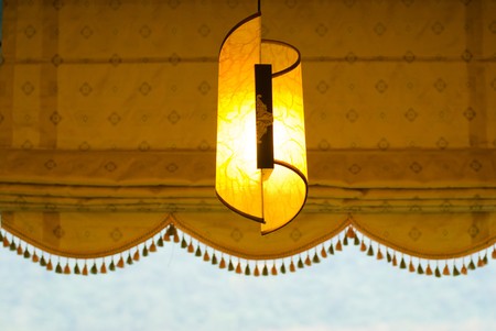 Art light with lampshade decoration near the windowの写真素材