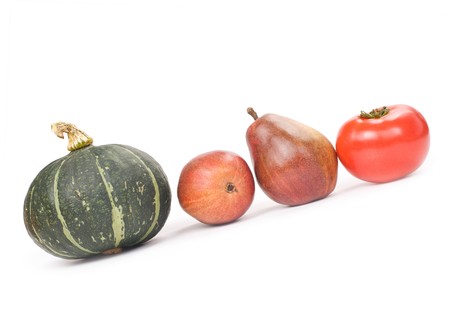 Fresh tomato, pears and pumpkin isolated on white backgroundの写真素材