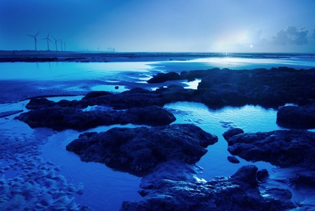 Moon light on the rock seacoastの写真素材