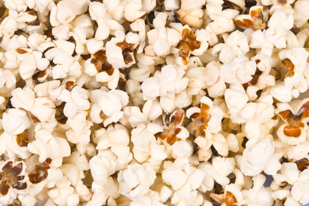 Full of delicious pop corn as backgroundの写真素材